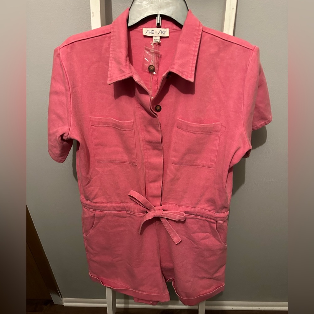 Gorgeous pink denim romper with tags